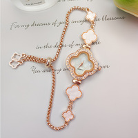 Montre élégante et tendance pour femme, avec un charme incrusté de diamants, trèfle à quatre feuilles, mouvement à quartz, résistance à l'eau 3BAR, verre en alliage