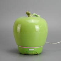 Handgemaakte glanzende porseleinen citroen aroma diffuser, luchtbevochtiger met frisse citrusolie en slimme timerinstellingen