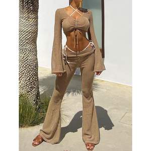 ชุดเซ็ตไหมพรมผู้หญิงแบบ 2 ชิ้น รุ่นคัสตอม 2026 เสื้อครอปแขนยาว กางเกงขาบานผูกเชือก ระบายอากาศได้ดี เหมาะสำหรับใส่พักผ่อน - Product Image 3