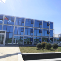 Bâtiment moderne bon marché maisons portables à ossature en acier maison en conteneur modulaire immeuble de bureaux détachable