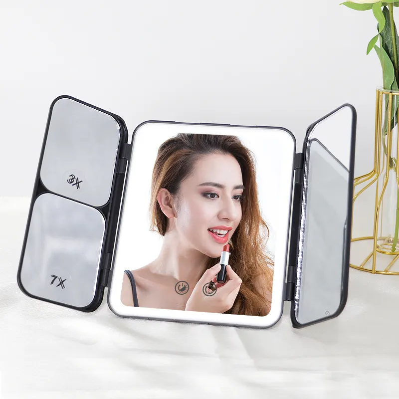 Beauty dimmerabile 3x 7x ingrandimento Smart Touch Screen da tavolo specchio da trucco con luci specchio cosmetico a tre pieghe a tre ante