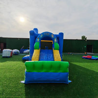 Château gonflable bleu pour location événementielle, château gonflable extérieur avec toboggan, château de saut pour enfants motif chien de dessin animé à vendre