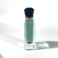 Bouteille en verre de luxe de forme unique de haute qualité 100ml emballage d'huile essentielle de vaporisateur de brouillard vide transparent bouteille de parfum vide