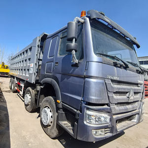 Sinotruk HOWO รถดัมพ์สีเทา8x4พร้อมเครื่องยนต์กำลังสูงระบบกันสะเทือนเสริมและถังน้ำมันระยะไกล - Product Image 1