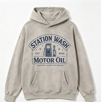 Sweat à capuche vieilli Kornit DTG, motif graphique rétro 'Fuel Pump Border Star' avec texte usé, effet déchiré sur tout le corps, poignets côtelés, style grunge