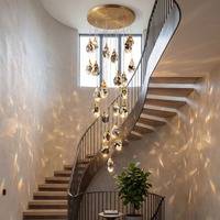 Luminaire suspendu en métal doré personnalisé pour la décoration résidentielle, luminaire moderne en cristal LED pour villa, escalier