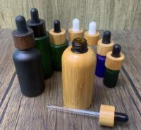 Natürliche Bunte Glasfläschchen 50ml Klare Ätherische Öl-Flaschen mit Mattiertem Bambusdeckel und Tropfer