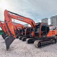 Excavadora de cadenas usada Doosan DX140LCA de alto rendimiento y bajo costo con tren de rodaje estable para proyectos de construcción en carreteras y limpieza de terrenos