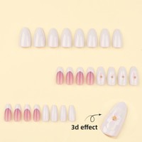Faux ongles courts en amande à presser, style French manucure avec motif floral 3D pour femmes, pour un usage quotidien et l'art des ongles.
