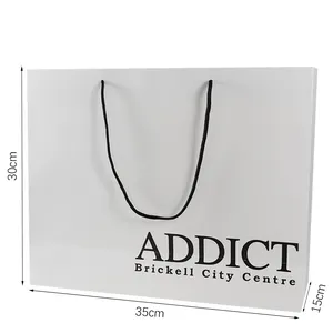 Bolsa de papel blanca de lujo con logotipo impreso personalizado al por mayor, bolsa de compras de boutique, bolsas de papel de regalo con su propio logotipo