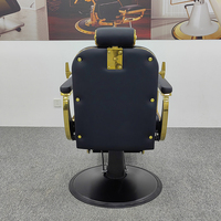 Chaise de salon de coiffure de luxe classique de style antique en cuir noir avec cadre doré et base ronde de haute qualité