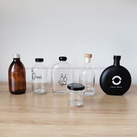 Bouteille en verre ronde de 500ml avec bouchon en métal | Bouteille de boisson avec logo personnalisé pour thé au lait, limonade et café glacé