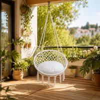 Fauteuil suspendu en macramé Woqi avec poche pour un confort supérieur