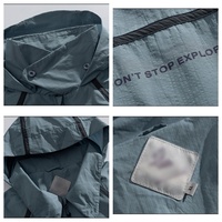 Veste technique à capuche pour homme Coupe-vent zippée Légère Multi-poches Urbaine Extérieure