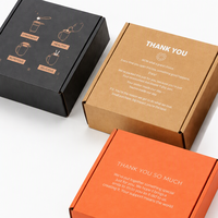 Ensemble de boîtes d'expédition en carton ondulé imprimées sur mesure, noir kraft, emballage cadeau orange