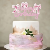 Décoration de gâteau d'anniversaire avec nœud rose, idéale pour décorer les gâteaux d'anniversaire des filles