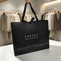 Sac cadeau de luxe noir personnalisé avec ruban en satin et logo imprimé, sac fourre-tout en papier pour boutique de vêtements, emballage de vente au détail