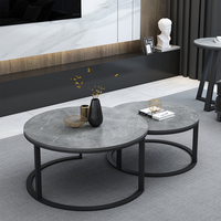 Table basse moderne, ronde et grise, en pierre interlée, meuble de salon, d'extérieur