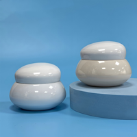 Nouveau design, pot cosmétique vide en plastique PET 200g, couleur blanche, style galet mignon, imitation céramique, pour crème visage et yeux