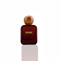 Flacon de parfum en verre à sertir carré et plat de luxe élégant de 30ml 50ml unique avec bouchon en résine