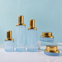 Ensemble cosmétique en verre personnalisé de luxe de haute qualité, pot de 30 g/50 g, flacon cylindrique de 40/100/120 ml, bouchon à vis sérigraphié pour les soins de la peau
