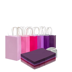 White Paper Gift <b>Bag</b> with Custom <b>Gold</b> Foil Branding Elegant Fashion Apparel Packaging Solutions - Product Image 1