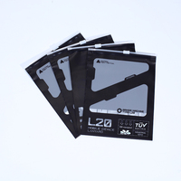 Sacs refermables noirs mats biodégradables personnalisés avec logo imprimé, fermeture éclair coulissante et fenêtre pour l'emballage de vêtements