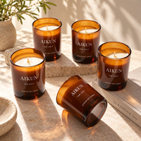 Bougie parfumée AIKUN en cire de soja, avec mèche en coton, dans un récipient transparent brun lisse, personnalisable (OEM/ODM) pour cadeaux de fêtes