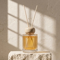 Bouteille diffuseur de parfum cylindrique transparente en verre pour la maison, avec logos personnalisables, vente en gros.