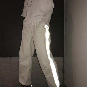 Wholesale Street Wear Casual Plaid Unisex Loose Nylon <b>Trousers</b> With Reflective Side Stripes Drawstrings Track Jogger Pants <b>Men</b> - Product Image 5