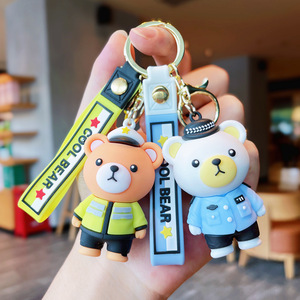 LLavero de oso de policía de dibujos animados creativo más nuevo de 2025, colgante de bolsa de muñeca de goma suave, regalo pequeño para evento promocional - Product Image 1