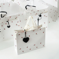 STARIVER Sac cadeau en papier écologique fait main, classique, avec logo personnalisé, motif floral, poignée en ruban de satin, impression à chaud pour vêtements