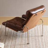 Fauteuil de salon en cuir de cire d'huile de cadre d'acier inoxydable d'art de conception classique pour la zone de réception de lobby de salon