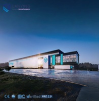 Bâtiment commercial moderne en structure acier avec façade personnalisée pour projets de vente au détail et commerciaux