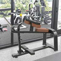 Appareil de musculation assis pour les mollets, à charge libre, pour l'entraînement des soleus, des gastrocnémies et des mollets.