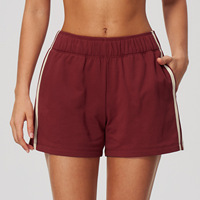 Shorts décontractés pour femmes, en molleton bouclette, avec bande latérale contrastante, taille élastique, coupe ample, avec poches, vente en gros OEM