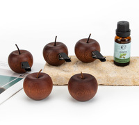 Diffuseur d'aromathérapie en bois en forme de pomme, ornement minimaliste parfumé pour la sortie d'air de la voiture et la décoration intérieure, cadeau