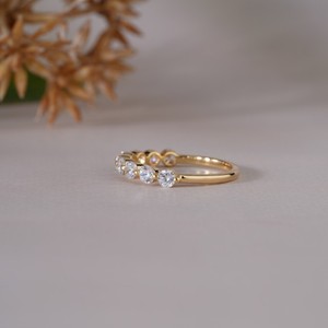 Luxury diamond eternity <b>ring</b> worn on woman hand showcasing elegant jewelry style ideal <b>wedding</b> engagement and everyday fashion - Product Image 6