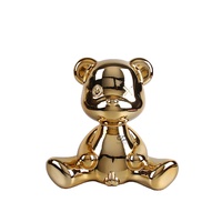 Sculpture moderne d'ours en or Figurine en résine d'art tendance pour la décoration de la maison Ornement de bureau Statue décorative de style pop