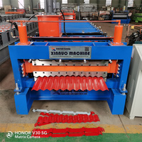 Machine de formage à rouleaux à double pont pour tôles d'acier de tuiles de toit trapézoïdales à ondulations d'eau