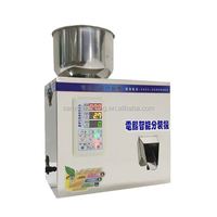 Machine de pesage et d'emballage semi-automatique électrique pour granulés de thé, poudre, farine, riz et autres matériaux