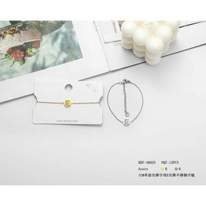 Bracciale in Acciaio Inossidabile con Ciondolo a Lettera E da 1 Cm, Gioiello alla Moda con Catena a Maglie - Product Image 1