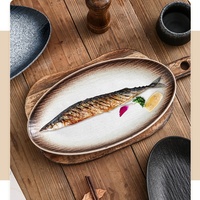 Service de vaisselle Assiette japonaise ovale noire et bleue de luxe avec design moucheté texturé Vaisselle en porcelaine de haute qualité