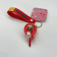 Porte-clés liquide en forme de sucette de la série Noël Rouge pour la décoration des fêtes avec figurines flottantes du Père Noël, idéal pour sacs à dos et sacs à main