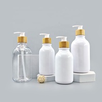 Flacon de shampooing vide circulaire personnalisé en PET blanc avec bouchon pompe en bambou pour lotion et sérum de soin de la peau