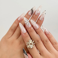 Faux ongles à presser style Pure Desire français, rose nude nacré, dentelle noire à pois, fleurs 3D, en acrylique, forme amande