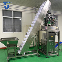 Machine de remplissage et de scellage automatique VFFS multifonctionnelle à 10 têtes pour sachets de bonbons, aliments soufflés, fruits secs, chips et snacks en film