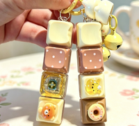 Mini clavier anti-stress portable avec breloque clavier, jouet sensoriel et pendentif clicker avec motif de dessin animé mignon, idéal comme cadeau pour étudiants
