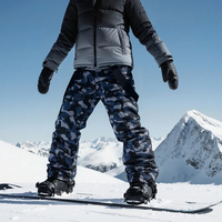 Nouveaux pantalons de snowboard camouflage pour hommes et femmes, bretelles, pantalons de ski, coupe-vent, imperméables, chauds, pantalons de neige pour couple, protection de la taille
