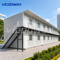 VICDOWEX Maison préfabriquée modulaire en conteneur avec un design contemporain pour usage bureautique et dortoir de travailleurs